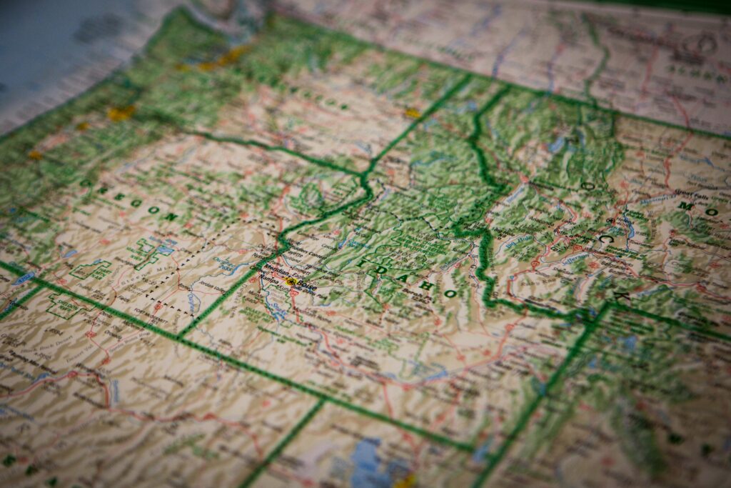 pexels-photo-108942-108942 Close-up of a detailed topographic map highlighting Idaho and its surrounding regions.